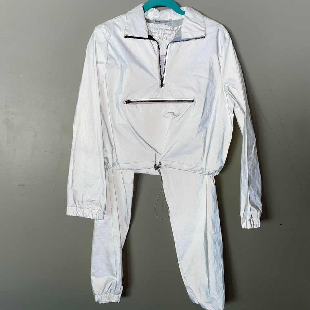 White matching windbreaker and pants